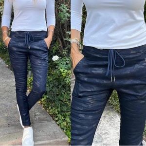 Shely Blue and black skinny tie waist camo jogger